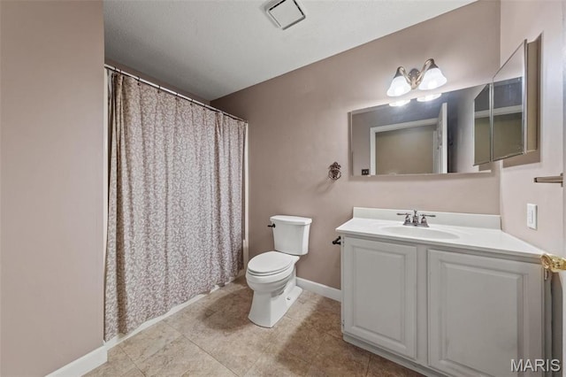 4044 Locke Ave, Bridgeton, MO 63044 - bathroom featuring toilet, vanity, baseboards, tile patterned floors, and curtained shower