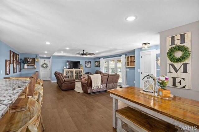 21510 Keyesport Rd, Keyesport, IL 62253 - living room featuring ceiling fan, wood finished floors, recessed lighting, and a raised ceiling