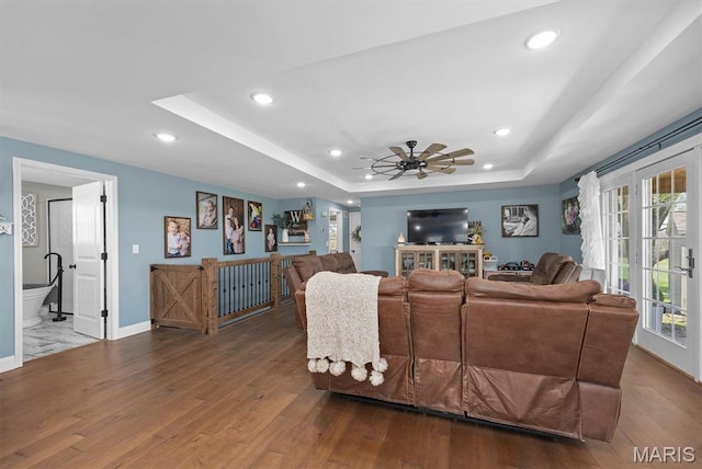 21510 Keyesport Rd, Keyesport, IL 62253 - living area with a tray ceiling, recessed lighting, wood finished floors, ceiling fan, and baseboards