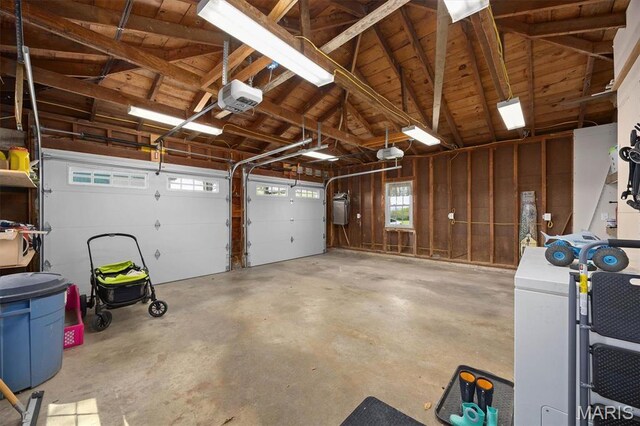21510 Keyesport Rd, Keyesport, IL 62253 - garage featuring a garage door opener and wood ceiling