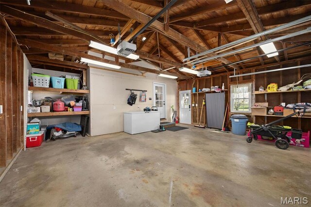 21510 Keyesport Rd, Keyesport, IL 62253 - garage with a garage door opener and fridge