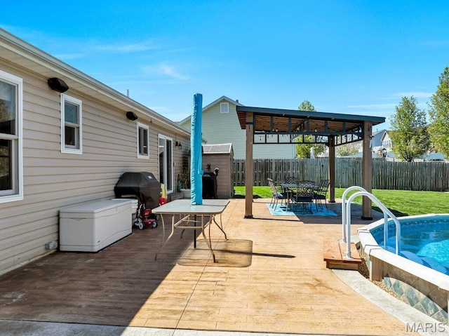 420 Glen Forest Dr, Troy, MO 63379 - view of patio / terrace with outdoor dining space, a shed, an outbuilding, and a grill