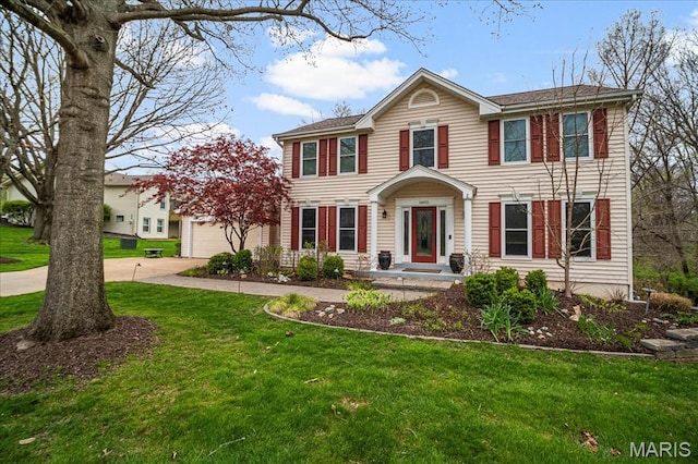 14815 Sycamore Manor Ct, Chesterfield, MO 63017 - colonial house with driveway, a front yard, and an attached garage