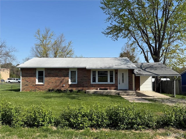 520 Keeton Rd, Rolla, MO 65401 - ranch-style house with brick siding and an attached carport