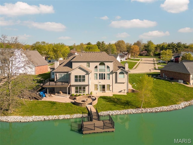 2017 Richview Dr, Saint Jacob, IL 62281 - rear view of property featuring a patio area, a water view, and a lawn