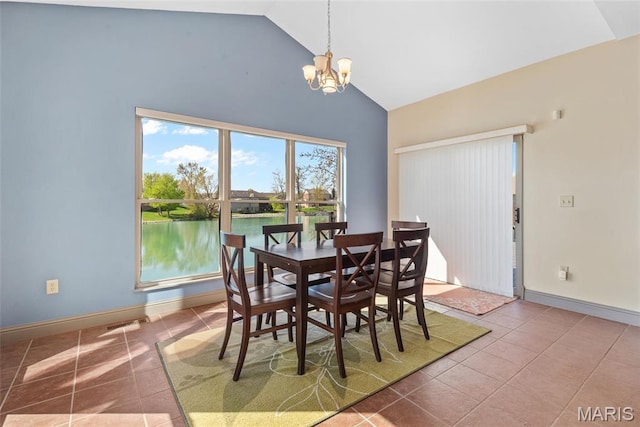 2017 Richview Dr, Saint Jacob, IL 62281 - tiled dining space featuring a chandelier, high vaulted ceiling, and baseboards