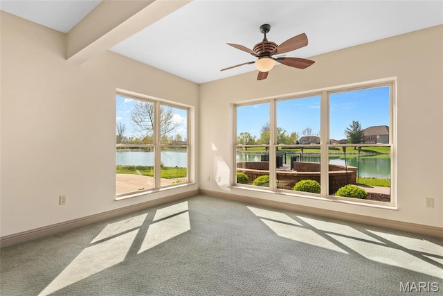 2017 Richview Dr, Saint Jacob, IL 62281 - carpeted spare room with a water view, baseboards, and ceiling fan