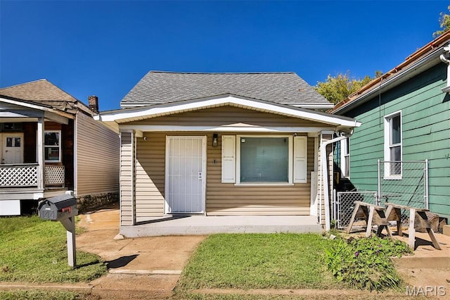 7613 Virginia Ave, Saint Louis, MO 63111 - view of front of house featuring roof with shingles