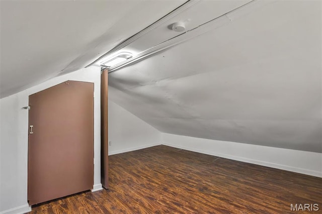 7613 Virginia Ave, Saint Louis, MO 63111 - bonus room featuring lofted ceiling, wood finished floors, and baseboards