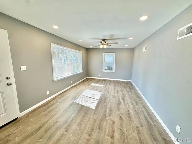 3345 Suncrest Ave, Saint Louis, MO 63114 - unfurnished room featuring ceiling fan, light wood-style floors, baseboards, and recessed lighting