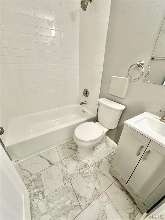 3345 Suncrest Ave, Saint Louis, MO 63114 - full bath featuring marble look tiles, bathtub / shower combination, toilet, baseboards, and vanity