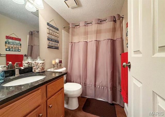 1 Berview Cir Unit B, Saint Louis, MO 63129 - full bathroom featuring a textured ceiling, vanity, toilet, and curtained shower