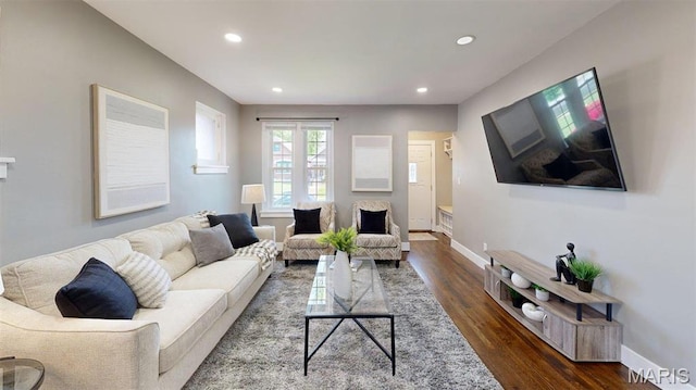 5714 Rhodes Ave, Saint Louis, MO 63109 - living room featuring dark wood-style flooring, recessed lighting, and baseboards