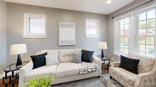 5714 Rhodes Ave, Saint Louis, MO 63109 - living area with wood finished floors, baseboards, and recessed lighting
