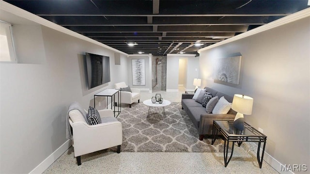 5714 Rhodes Ave, Saint Louis, MO 63109 - living area featuring baseboards and speckle patterned floor