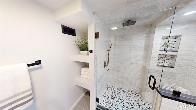 5714 Rhodes Ave, Saint Louis, MO 63109 - full bath featuring a stall shower and baseboards