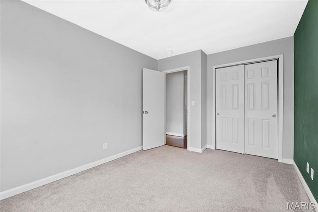 7026 Winona Ave, Saint Louis, MO 63109 - unfurnished bedroom with carpet flooring and a closet