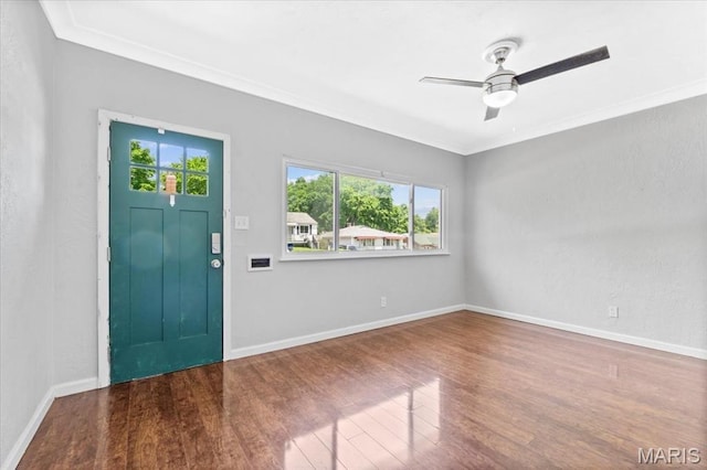 7026 Winona Ave, Saint Louis, MO 63109 - foyer featuring wood finished floors, ceiling fan, and crown molding