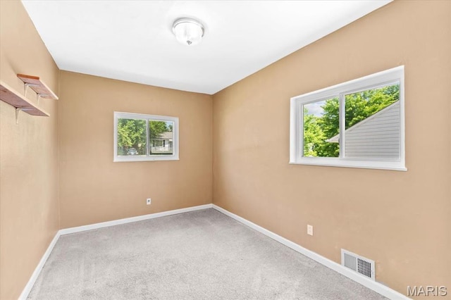 7026 Winona Ave, Saint Louis, MO 63109 - carpeted spare room with baseboards