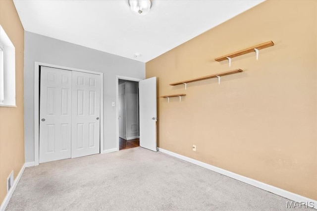 7026 Winona Ave, Saint Louis, MO 63109 - unfurnished bedroom with carpet flooring and a closet