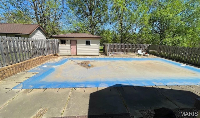 39988 Billy Blvd, Campbell, MO 63933 - view of pool featuring an outbuilding, a fenced backyard, and a patio area