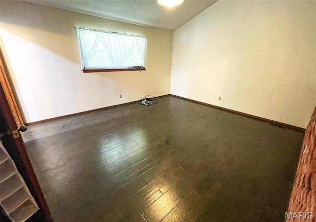 39988 Billy Blvd, Campbell, MO 63933 - unfurnished room with baseboards and hardwood / wood-style flooring