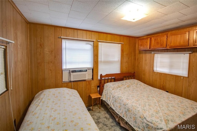 798 N Broadway, Kampsville, IL 62053 - carpeted bedroom featuring cooling unit and wood walls