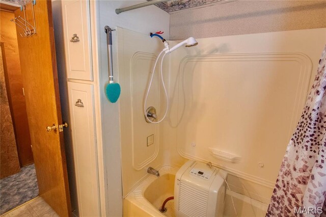 798 N Broadway, Kampsville, IL 62053 - bathroom featuring shower / tub combo