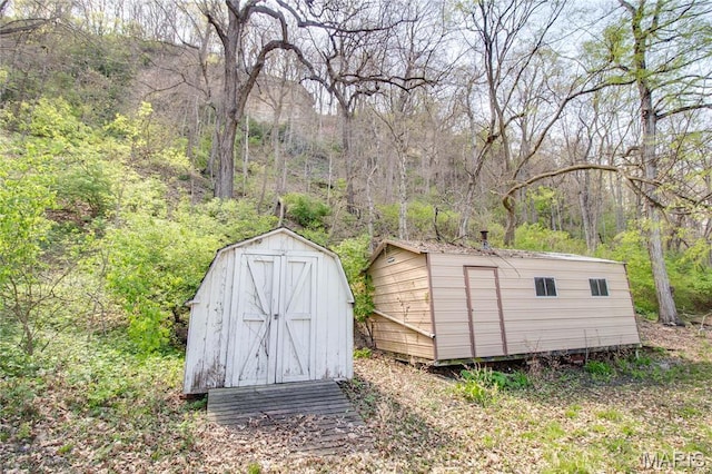 798 N Broadway, Kampsville, IL 62053 - view of shed featuring a wooded view