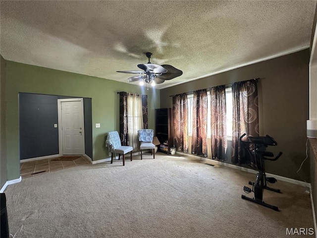 300 W 5th, New London, MO 63459 - living area with ceiling fan, a textured ceiling, carpet, and baseboards