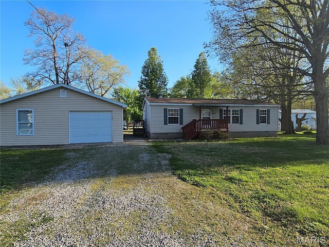 507 Ash St, Percy, IL 62272 - manufactured / mobile home featuring crawl space, driveway, an outdoor structure, and a front yard