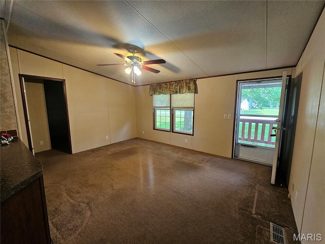 507 Ash St, Percy, IL 62272 - carpeted spare room with plenty of natural light, a textured ceiling, and ceiling fan