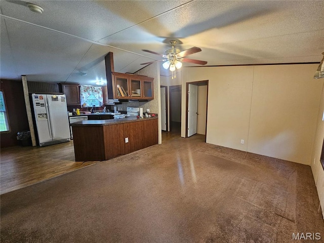 507 Ash St, Percy, IL 62272 - kitchen featuring white refrigerator with ice dispenser, electric stove, glass insert cabinets, ceiling fan, and dark countertops