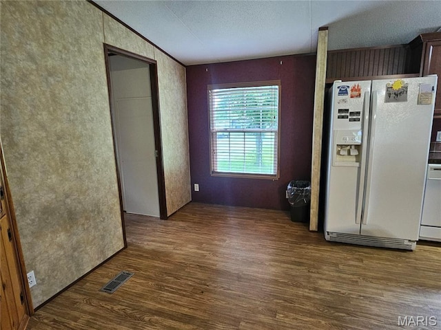 507 Ash St, Percy, IL 62272 - unfurnished dining area featuring dark wood finished floors and a textured ceiling