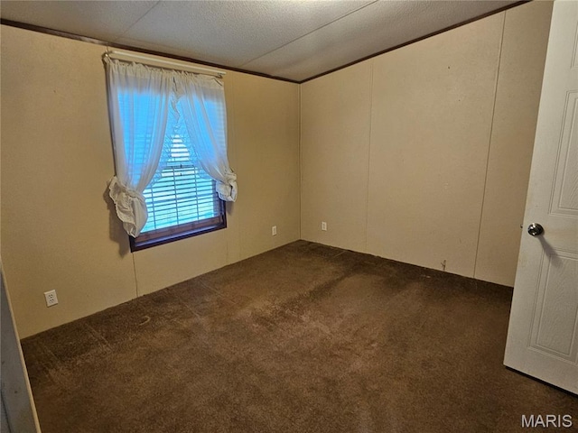 507 Ash St, Percy, IL 62272 - empty room featuring dark carpet