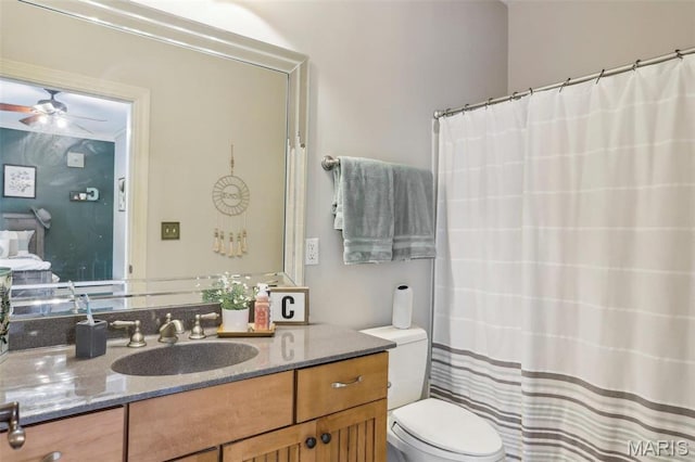 1002 Chesterfield Forest Dr, Wildwood, MO 63005 - full bathroom featuring toilet, vanity, ceiling fan, and a shower with shower curtain