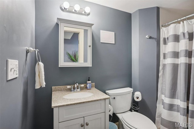 1002 Chesterfield Forest Dr, Wildwood, MO 63005 - bathroom featuring vanity, toilet, and curtained shower