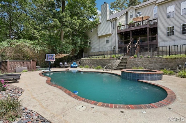 1002 Chesterfield Forest Dr, Wildwood, MO 63005 - view of swimming pool with stairway, fence, a pool with connected hot tub, and a patio