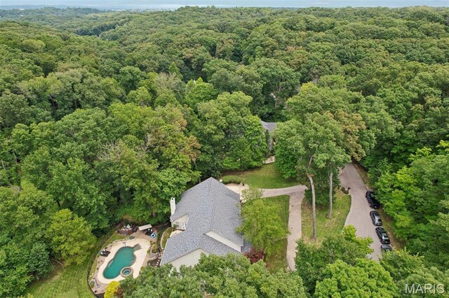1002 Chesterfield Forest Dr, Wildwood, MO 63005 - aerial overview of property's location with a forest and a pool