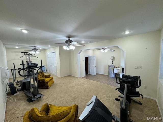2925 Wayne Ave, Poplar Bluff, MO 63901 - workout area featuring carpet, a ceiling fan, recessed lighting, baseboards, and a sink