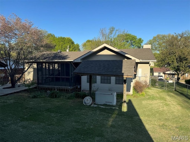 2925 Wayne Ave, Poplar Bluff, MO 63901 - rear view of house with roof with shingles, a chimney, and a sunroom