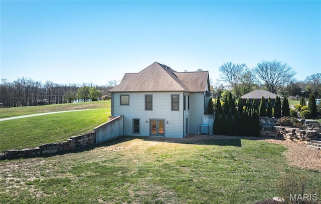 1100 Landon Rd, Bourbon, MO 65441 - back of house with french doors and a yard