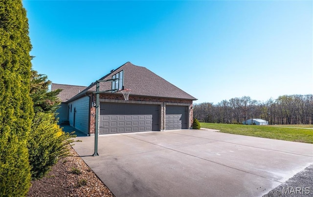1100 Landon Rd, Bourbon, MO 65441 - view of property exterior with brick siding, a yard, concrete driveway, a shingled roof, and an attached garage