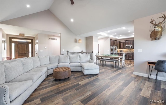 1100 Landon Rd, Bourbon, MO 65441 - living area with recessed lighting, high vaulted ceiling, and dark wood-style flooring