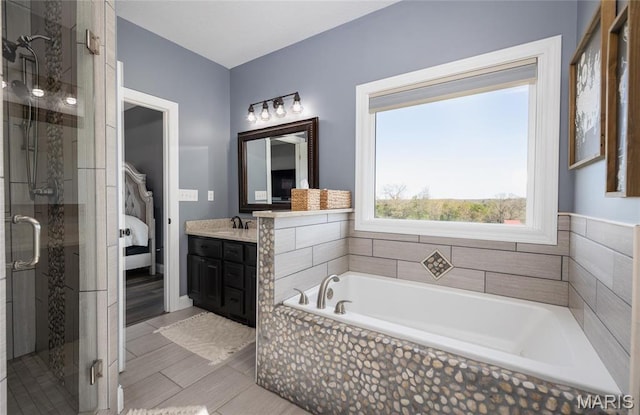 1100 Landon Rd, Bourbon, MO 65441 - bathroom featuring vanity, a shower stall, a bath, and ensuite bath