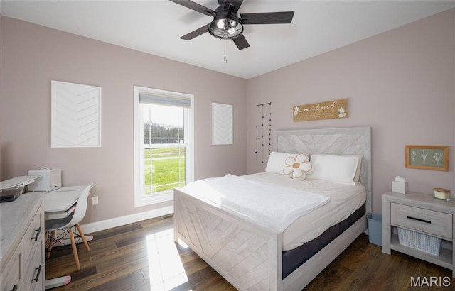 1100 Landon Rd, Bourbon, MO 65441 - bedroom featuring dark wood-style floors, baseboards, and a ceiling fan