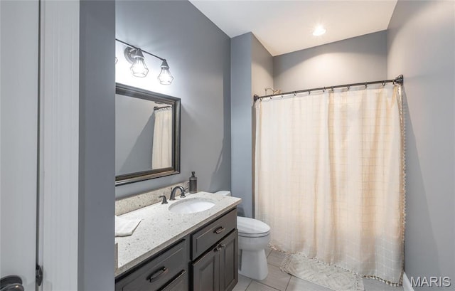 1100 Landon Rd, Bourbon, MO 65441 - full bathroom with toilet, vanity, curtained shower, and tile patterned flooring