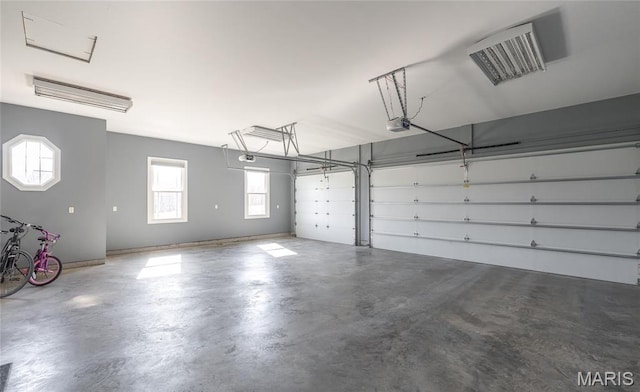 1100 Landon Rd, Bourbon, MO 65441 - garage with a garage door opener