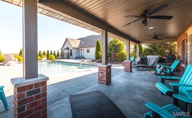 1100 Landon Rd, Bourbon, MO 65441 - view of patio featuring an outdoor pool and a ceiling fan
