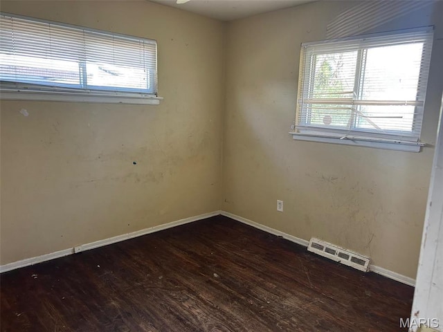 6016 Shillington Dr, Berkeley, MO 63134 - unfurnished room featuring wood finished floors and baseboards